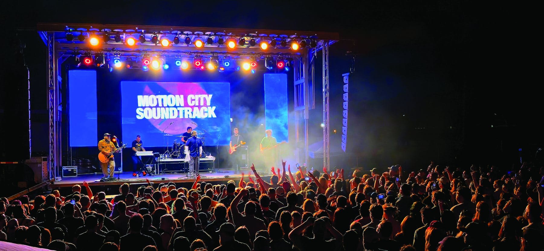 Concert stage lit by Livewire
